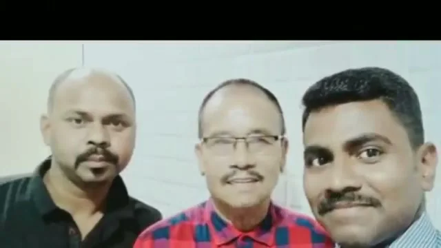 Sevagan Satheesh with two men he has helped